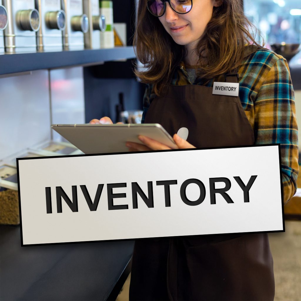 Warehouse worker with stock template tag.