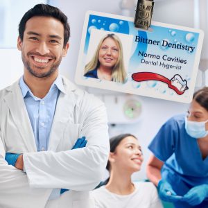 Dentist and hygienist and a photo ID badge with a lanyard with a clip. 